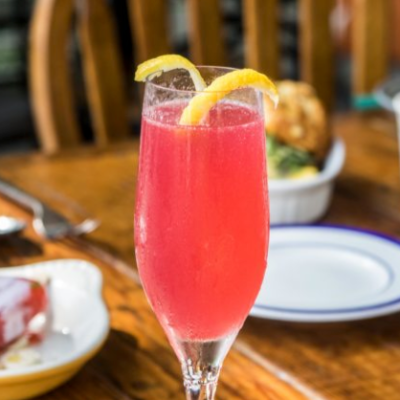 a plate of food and a cup of coffee on a table