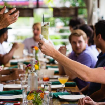a group of people sitting at a table