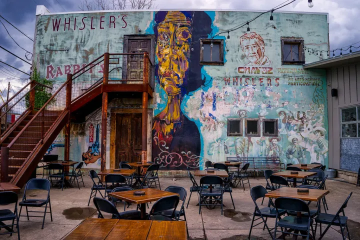 a chair sitting in front of a building
